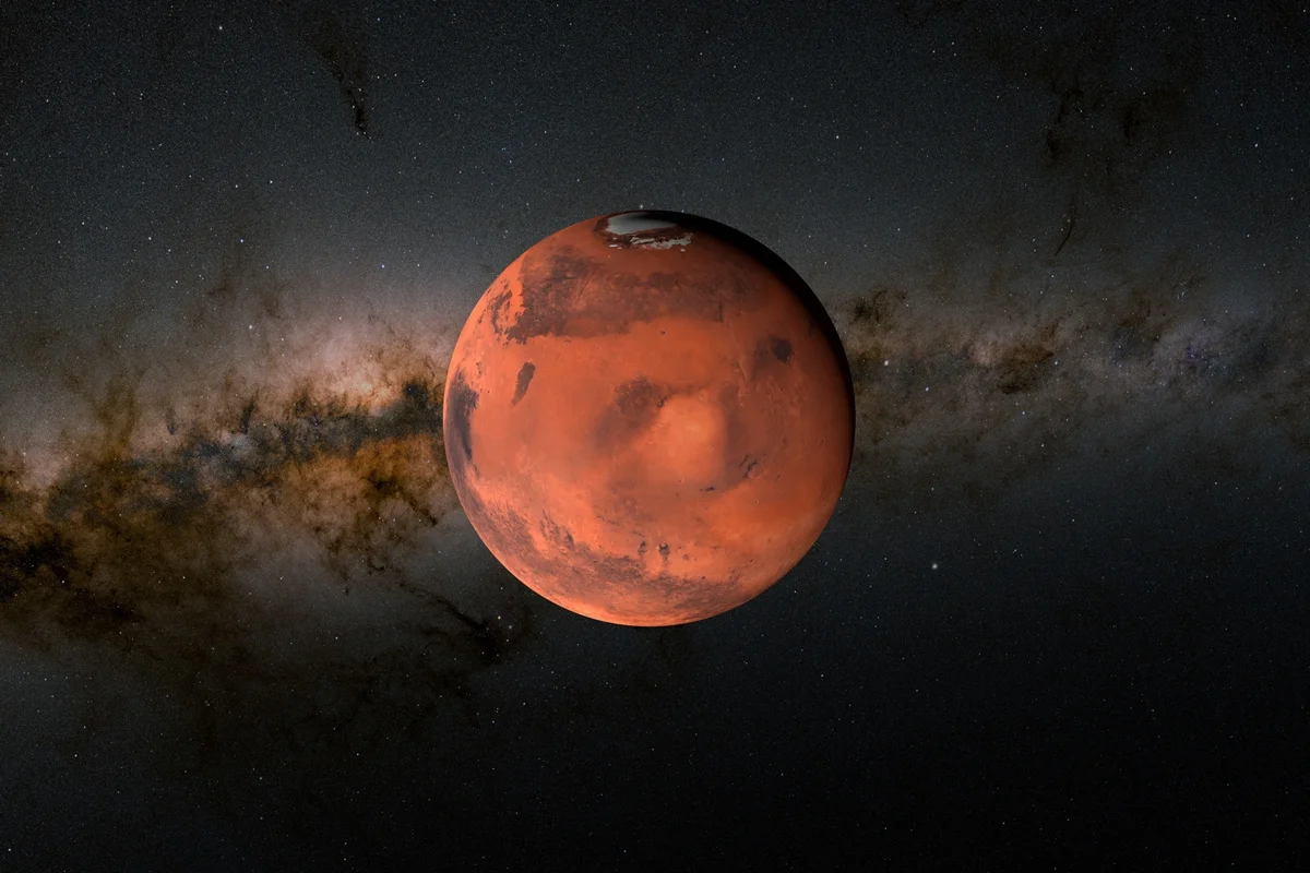 Marte, ilustração. Marte é o quarto planeta a partir do Sol. É um mundo rochoso e desértico. Orbita o Sol a uma distância média de cerca de 227 milhões de quilômetros. Seu diâmetro é aproximadamente metade do da Terra. A cor vermelha se deve aos óxidos de ferro presentes nas rochas.